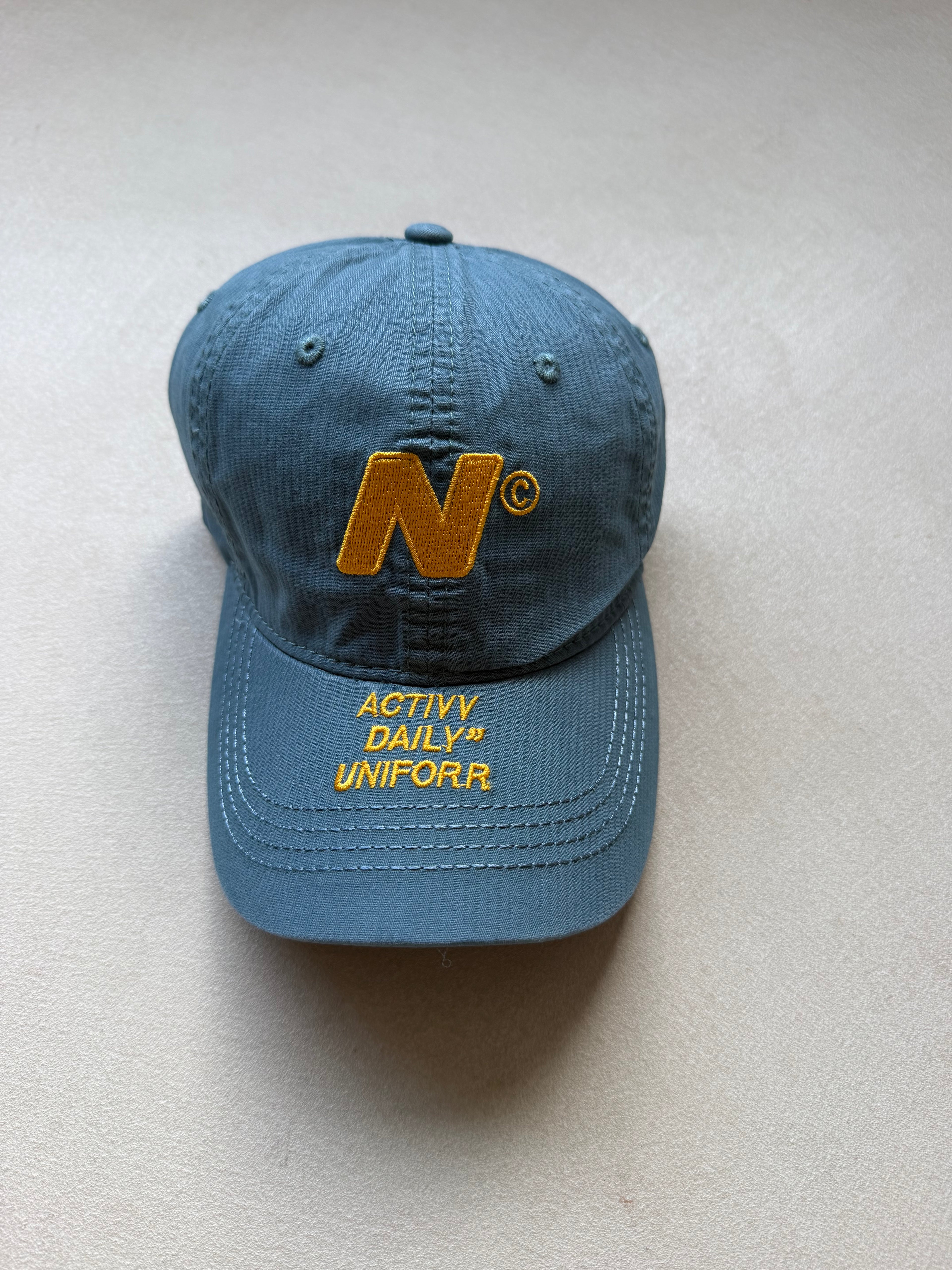 Initial cap light blue