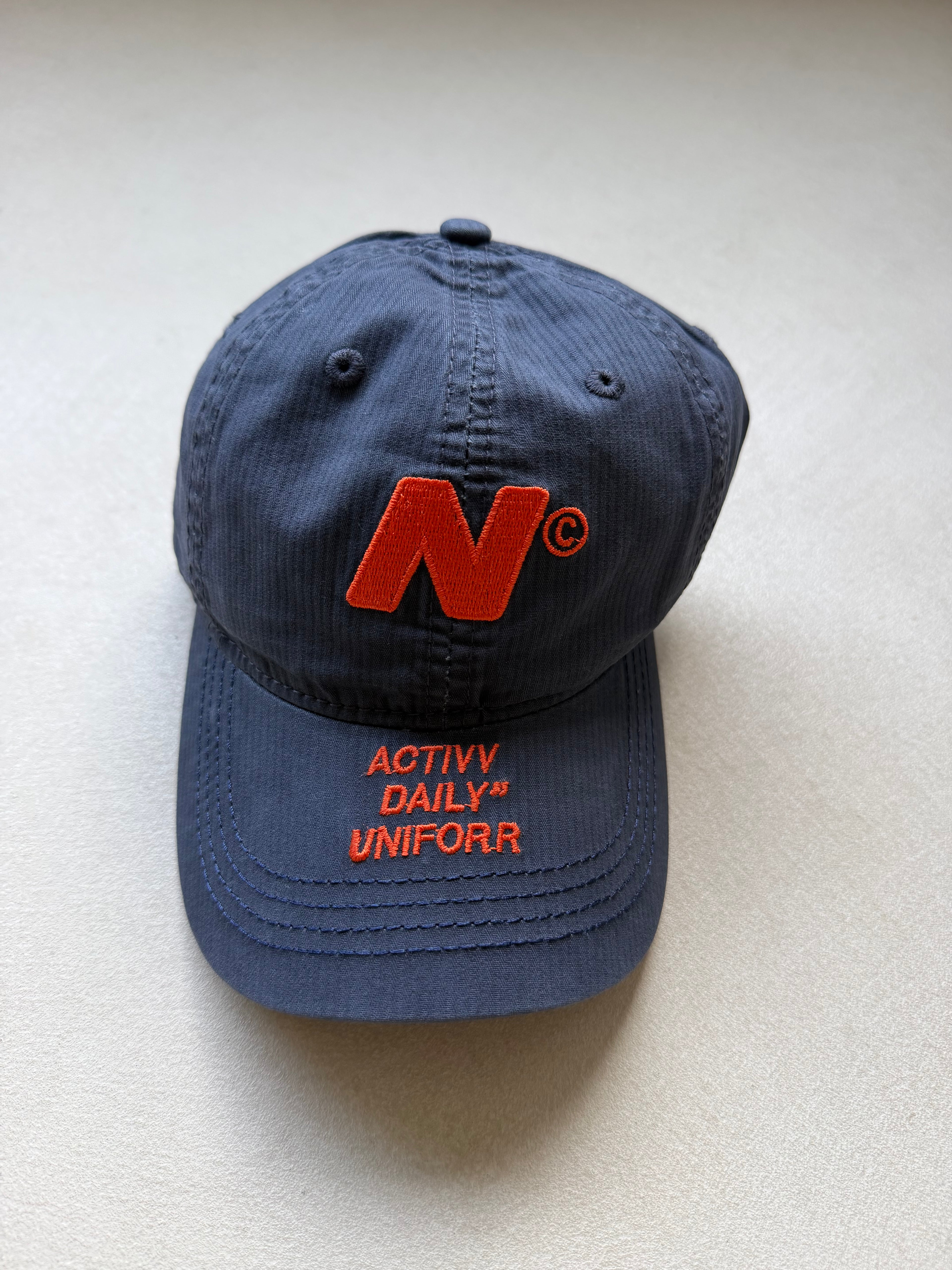 Initial cap dark blue
